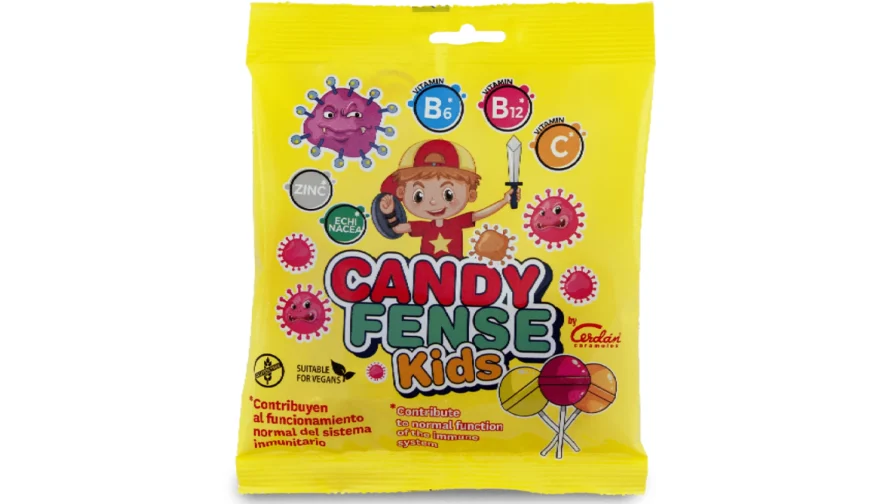 Bolsa de caramelos amarilla decorada con gráficos de un niño e iconos de vitaminas